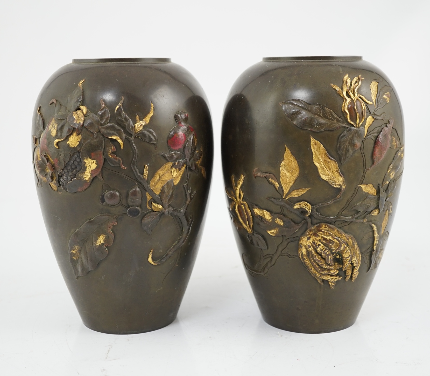 A pair of Japanese bronze and mixed metal ovoid vases, Meiji period